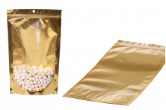 Doy Pack tipi çantalar 180x50x280 mm  alüminyum arka yüzü altın sarısı, önü şeffaf fermuarlı ve ısıl yapıştırma ile kapatma özelliği - 100 adet