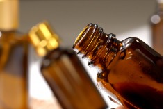 Стъклена овална кафява бутилка 10 мл за етерични масла (PP18)