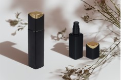 Luxury 40 ml glass bottle in black color with cream pump and acrylic cap