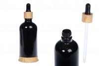 Стъклена бутилка 100 мл черна с пластмасов капкомер и дървена основа