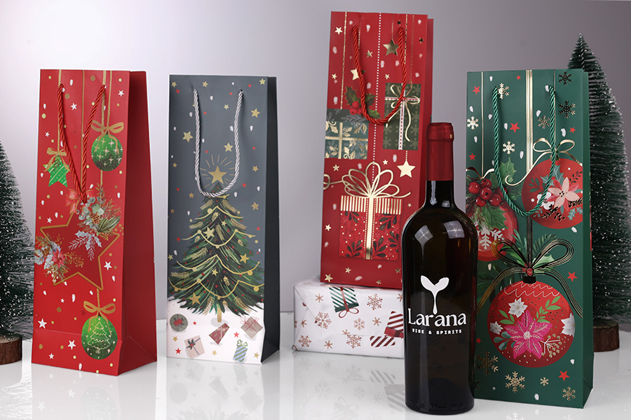 Коледна хартиена торбичка за бутилка вино 127x83x360 мм - 12 броя микс дизайн и цветове-