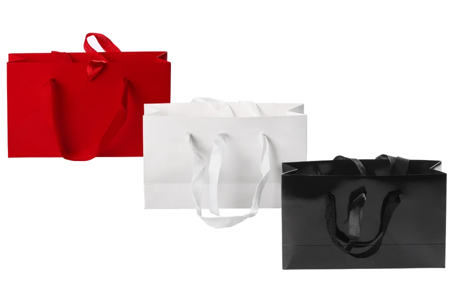 Подаръчна торбичка 250x80x150 мм с дръжка и лентичка за връзване в различни цветове - 20 бр-изображение_група