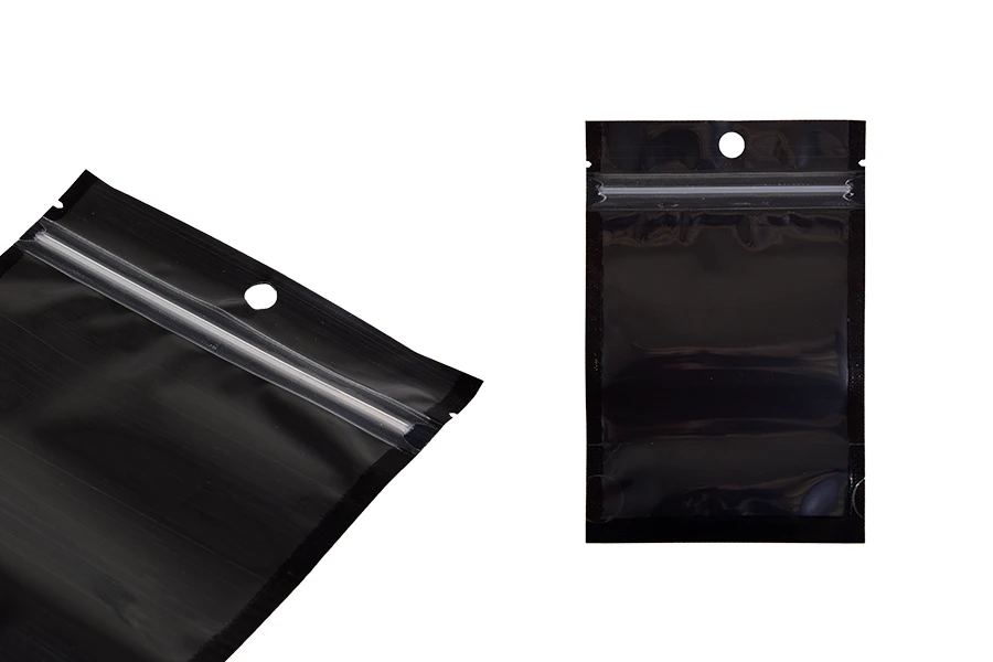 Алуминиева опаковка тип ДОЙ-ПАК 90x30x140 mm , черна отзад, прозрачна предна част с "цип" затваряне 100 бр./пакет Алуминиева опаковка тип ДОЙ-ПАК 90x30x140 mm , черна отзад, прозрачна предна част с "цип" затваряне 100 бр./пакет