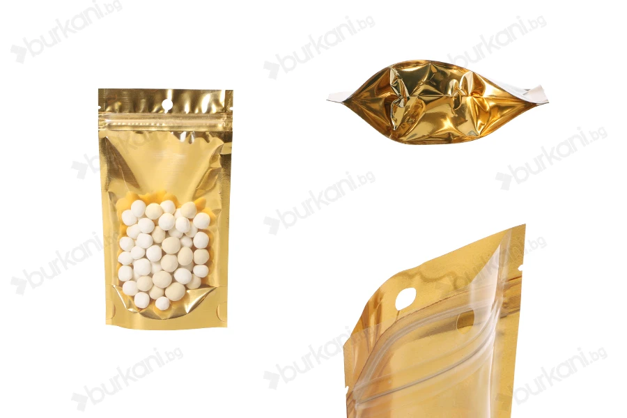 Алуминиеви пликове тип Doy Pack 100x30x180 mm със златиста задна част и  прозрачна предна част с "цип" затваряне и място за термозаваряване - 100 бр.-изображение_продукт