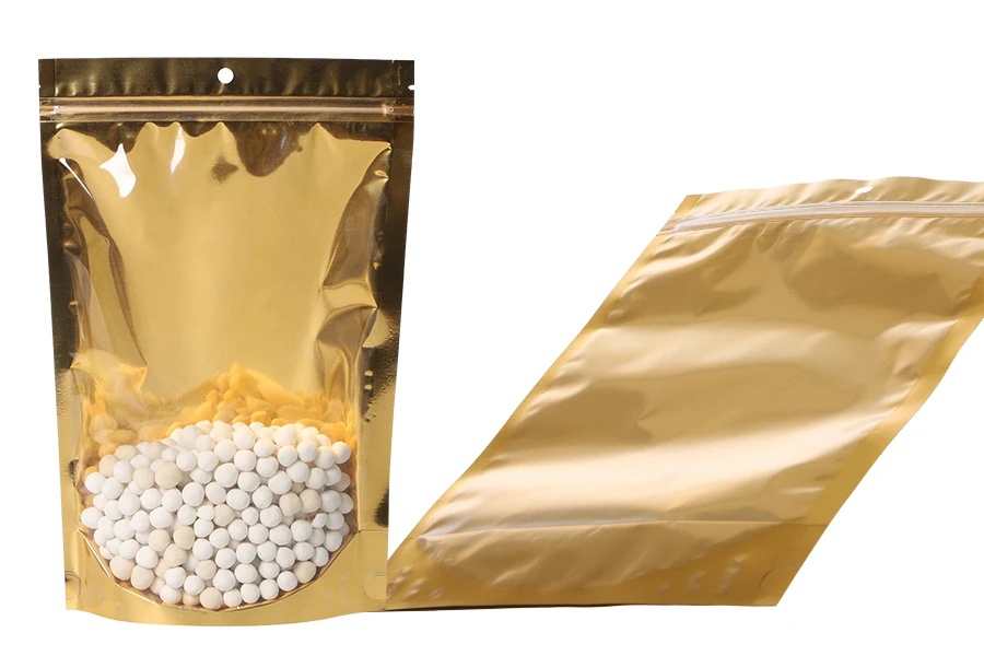 Пликове тип  Doy Pack 200x50x300 мм алуминиеви със златиста задна част, прозрачна предна част с "цип" затваряне и термозаваряване - 100 бр.-изображение_група