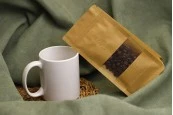Крафт торбичка тип Doy Pack 100x60x200 mm, с цип, клапа, прозорец, вътрешна и външна прозрачна облицовка и възможност за термозаваряване - 25 бр. Крафт торбичка тип Doy Pack 100x60x200 mm, с цип, клапа, прозорец, вътрешна и външна прозрачна облицовка и възможност за термозаваряване - 25 бр.