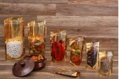 Алуминиеви торбички тип Doy Pack 130x40x205 mm със златиста задна част, прозрачна предна част с "цип" затваряне и място за термозаваряване - 100 бр. Алуминиеви торбички тип Doy Pack 130x40x205 mm със златиста задна част, прозрачна предна част с "цип" затваряне и място за термозаваряване - 100 бр.
