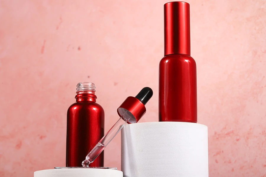 Стъклена червена бутилка с капакомер и капачка 30 мл-изображение_група