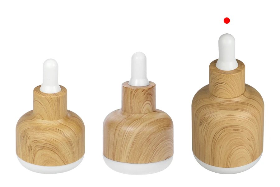 Shishe qelqi 30 ml me veshje plastike dhe pikatore në dizajn druri-изображение_група