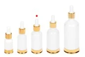 Стъклена бутилка 30 мл с бяла със златиста алуминиева основа-изображение_група