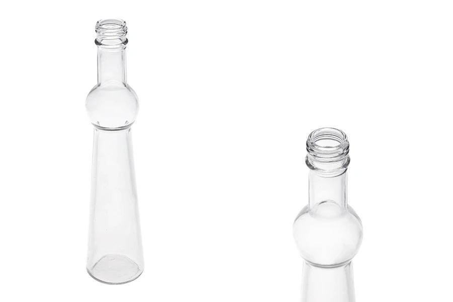 Стъклена бутилка с размери 53x240 - 180 ml Стъклена бутилка с размери 53x240 - 180 ml