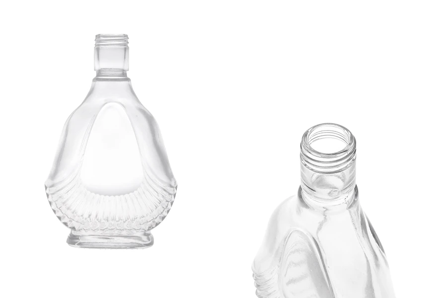Стъклена бутилка с размери 90x38x145 - 130 ml Стъклена бутилка с размери 90x38x145 - 130 ml