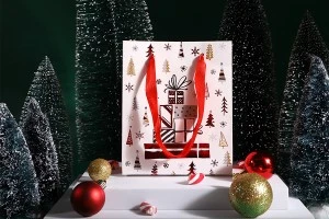 Хартиени коледни подаръчни торбички с размер 140x70x170 mm (микс дизайн) - 12 бр./пакет-изображение_група