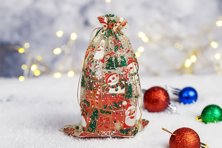 Коледна златна торбичка от органза 200х300 мм - 25 бр-изображение_група