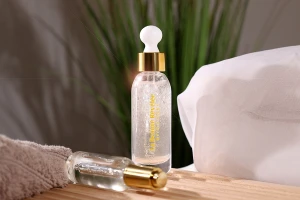 Стъклена бутилка 50 мл със златист капкомер -изображение_група