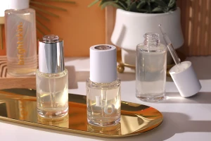 Пластмасова (PETG) бутилка 50 мл с бял капкомер с бутон (прозрачен)-изображение_група