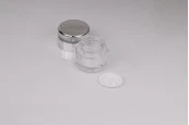 Стъклен буркан 30 мл с пластмасова акрилна луксозна капачка и вътрешен уплътнител Стъклен буркан 30 мл с пластмасова акрилна луксозна капачка и вътрешен уплътнител-изображение_360