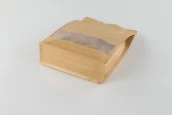 Крафт торбичкки тип Doy Pack, с "цип" затваряне, прозорец, вътрешна и външна прозрачна облицовка и възможност за термозапечатване 200x80x300 mm - 50 бр. Крафт торбичкки тип Doy Pack, с "цип" затваряне, прозорец, вътрешна и външна прозрачна облицовка и възможност за термозапечатване 200x80x300 mm - 50 бр.