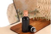 Стъклена черна бутилка за етерични масла 50 ml  PP18