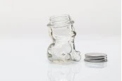 Стъклен буркан във формата на мече с алуминиева капачка 80 мл Стъклен буркан във формата на мече с алуминиева капачка 80 мл